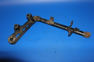Rear brake caliper mount bracket and torque arm