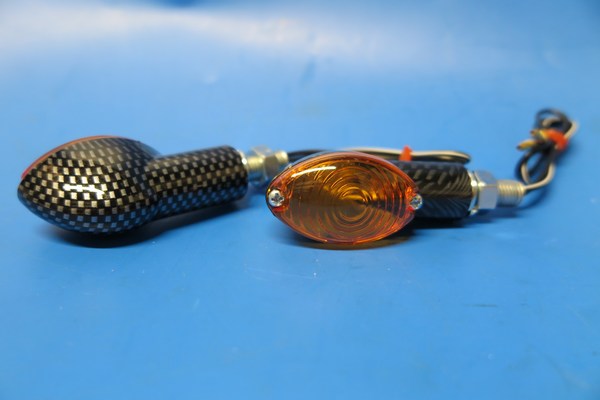 Indicators Cateye mini short carbon stem with amber lens WE35024
